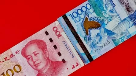 Тенге и юань будут еще больше использовать в расчетах Казахстан и Китай