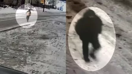 Грабитель с украденным сейфом попал на видео в Казахстане 