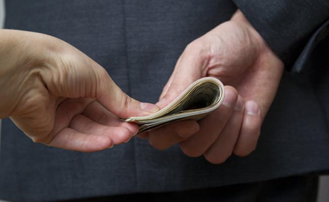 Судья 800 мың теңге парамен ұсталды